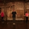 Three people jumping rope