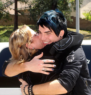 adam-and-kathie-greeting-web Adam Lambert gets a welcome home hug from Kathie Urban of Met2 in San Diego