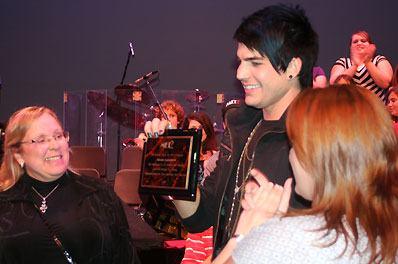 plaque-presentation-web American Idol Finalist Adam Lambert receives a warm welcome home to Met2 in San Diego. Photo courtesy Nancy Hickey.